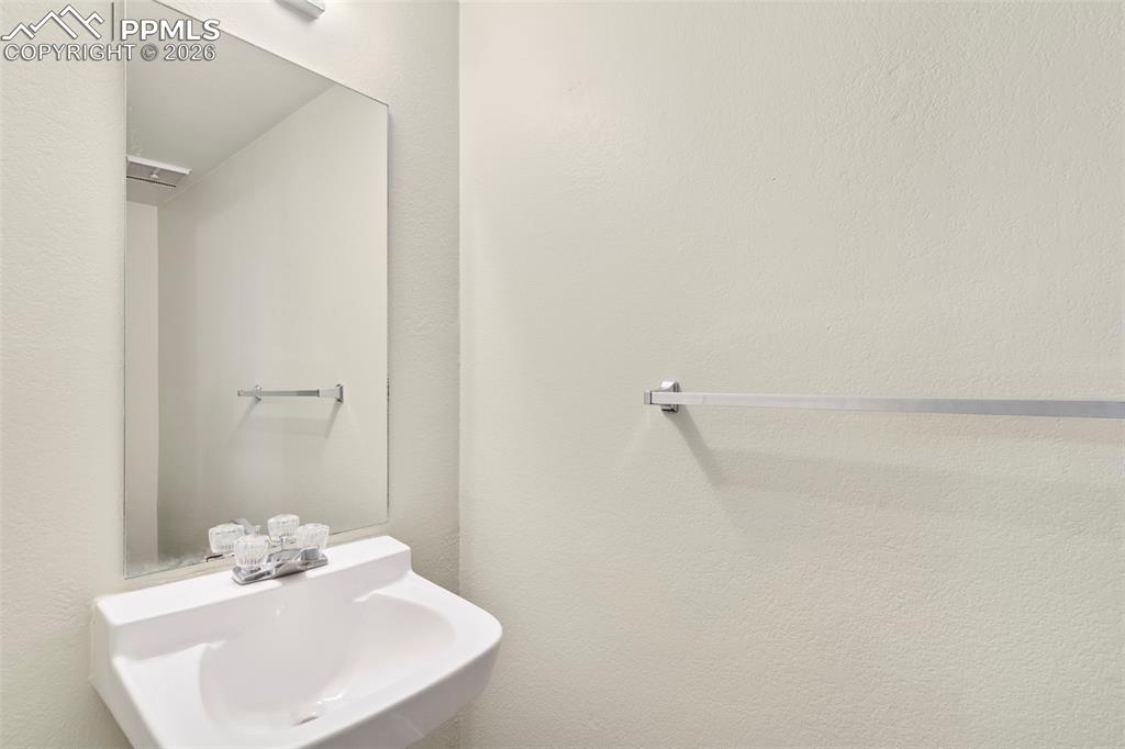 4301 Hunting Meadows Circle Colorado Springs, CO 80916 - Photo 7 of 17 Half bath