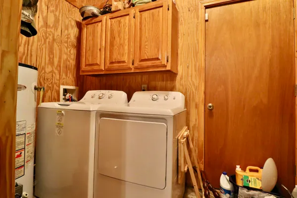a utility room with dryer and washer