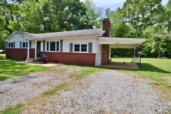 a view of a yard with porch
