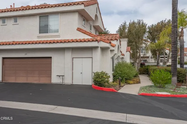 a house view with a outdoor space
