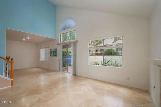 an empty room with windows