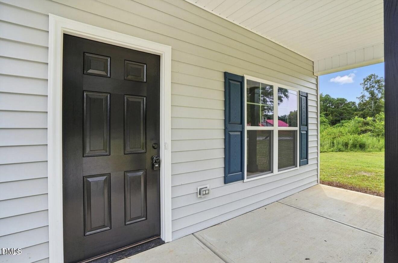 1240 West Blackman Road Dunn, NC 28334 - Photo 4 of 25 a view of front door of house