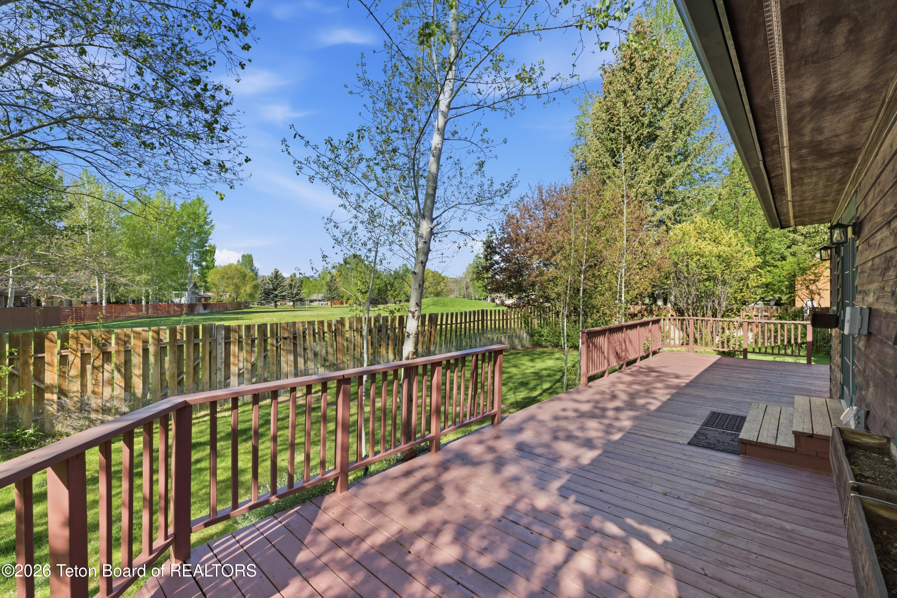 3017 Rangeview Drive Jackson, WY 83001 - Photo 19 of 26 19 Rear Deck Park Summer