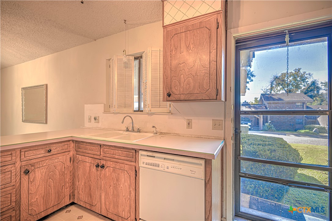4000 Hickory Road, Unit 3 Temple, TX 76502 - Photo 11 of 34 a bathroom with a sink and a mirror