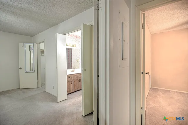 a view of a bathroom with a glass door