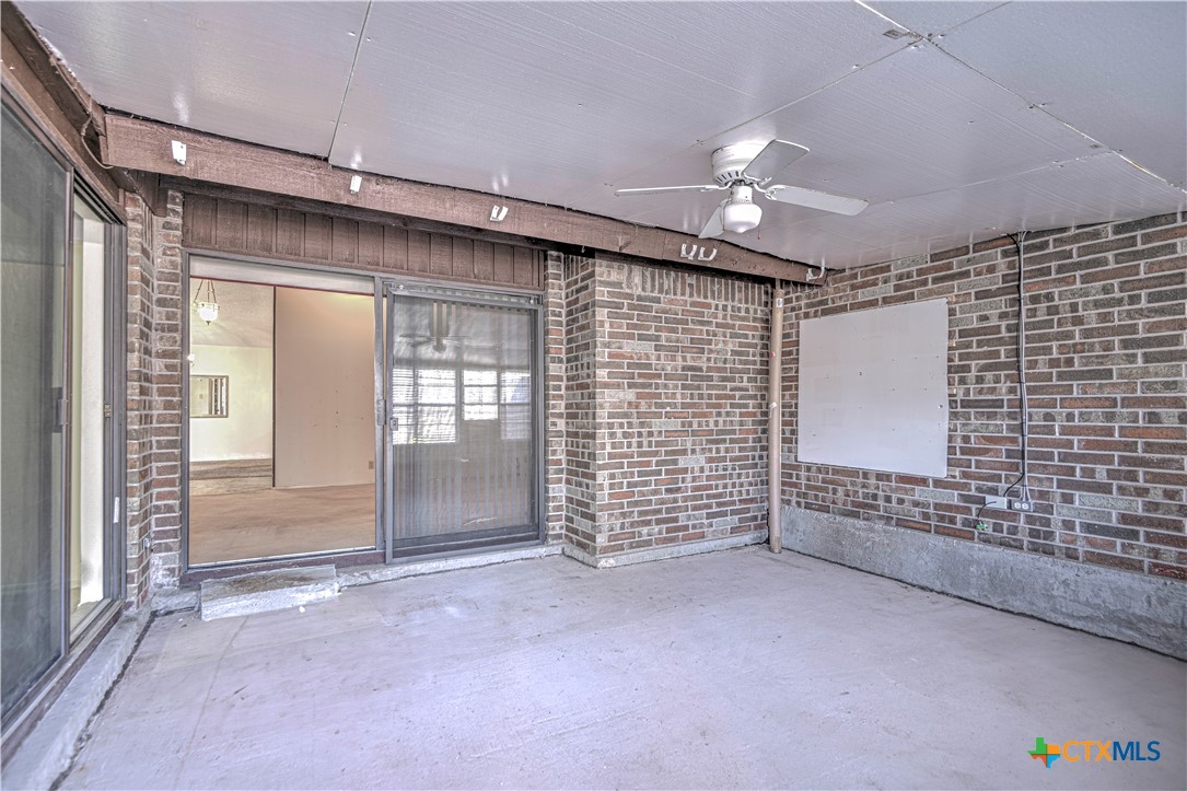 4000 Hickory Road, Unit 3 Temple, TX 76502 - Photo 32 of 34 a view of livingroom with an empty room and chandelier fan