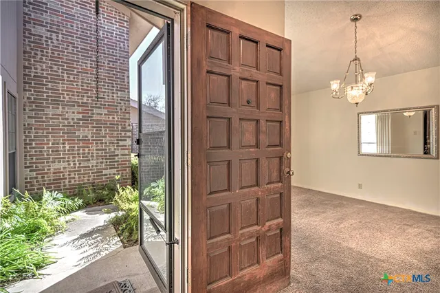 a view of a bedroom with windows