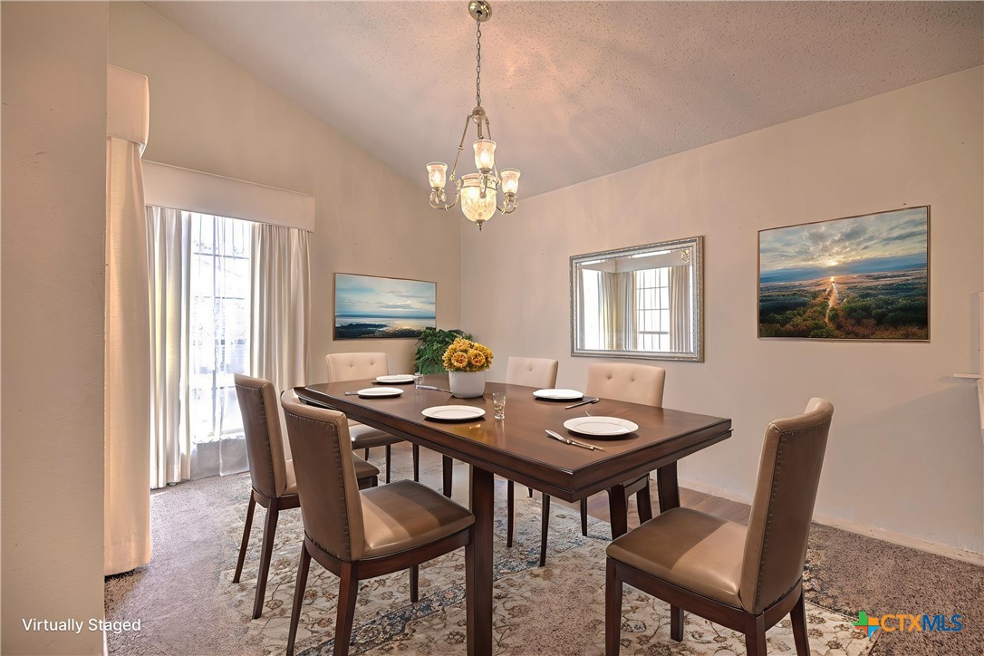 4000 Hickory Road, Unit 3 Temple, TX 76502 - Photo 5 of 34 a view of a dining room with furniture window and wooden floor