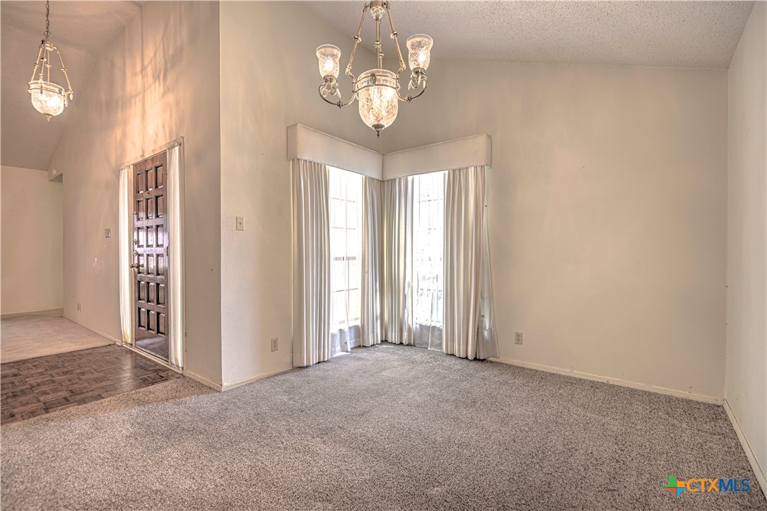 4000 Hickory Road, Unit 3 Temple, TX 76502 - Photo 7 of 34 a view of a chandelier in a room
