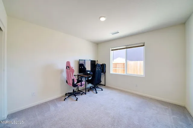 a view of a workspace with furniture and a livingroom