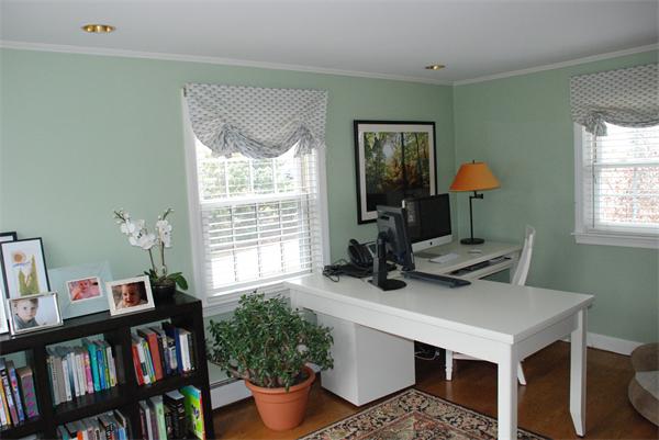 43 River Glen Road Wellesley, MA 02481 - Photo 17 of 20 a view of a workspace with furniture and a book shelf