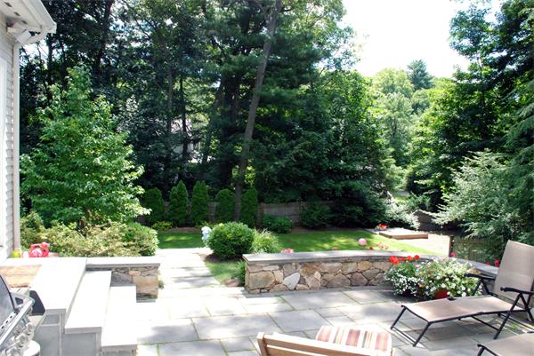 43 River Glen Road Wellesley, MA 02481 - Photo 4 of 20 a view of backyard with plants and outdoor seating