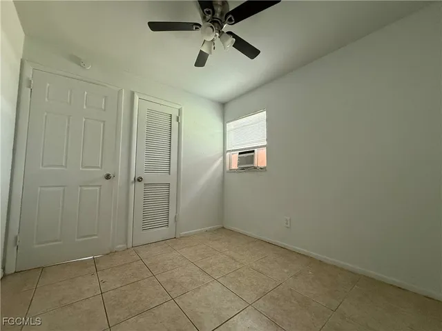 a view of an empty room and window