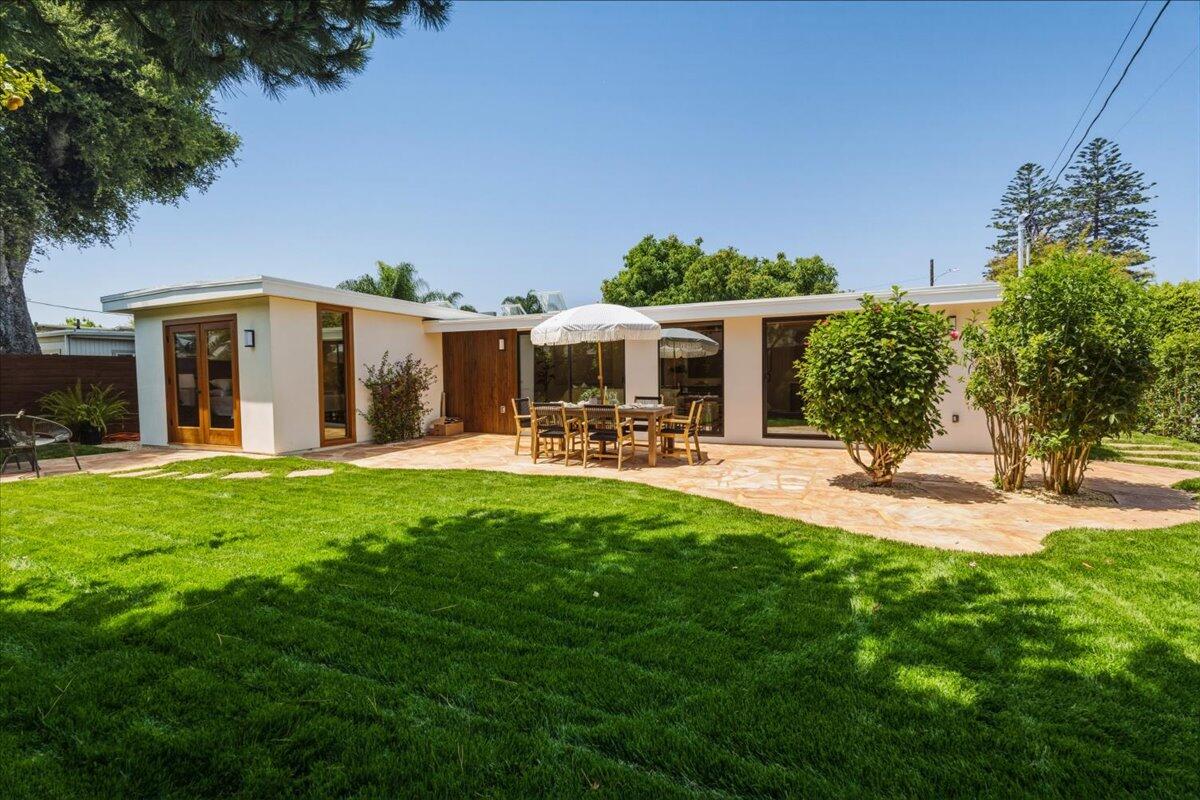 151 Kinman Avenue Goleta, CA 93117 - Photo 17 of 20 a view of a house with backyard porch and sitting area
