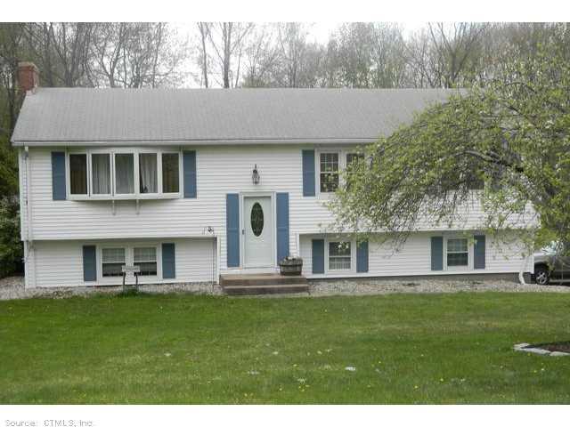 11 Volpi Road Bolton, CT 06043 - Photo 1 of 1 a aerial view of a house with a yard table and chairs