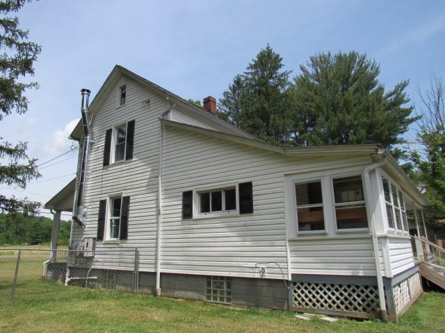270 Wilpen Road Ligonier, PA 15658 - Photo 20 of 20 a view of a house with a yard
