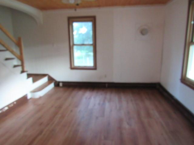 270 Wilpen Road Ligonier, PA 15658 - Photo 2 of 20 an empty room with wooden floor and windows