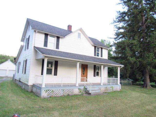 270 Wilpen Road Ligonier, PA 15658 - Photo 5 of 20 a front view of a house with a yard
