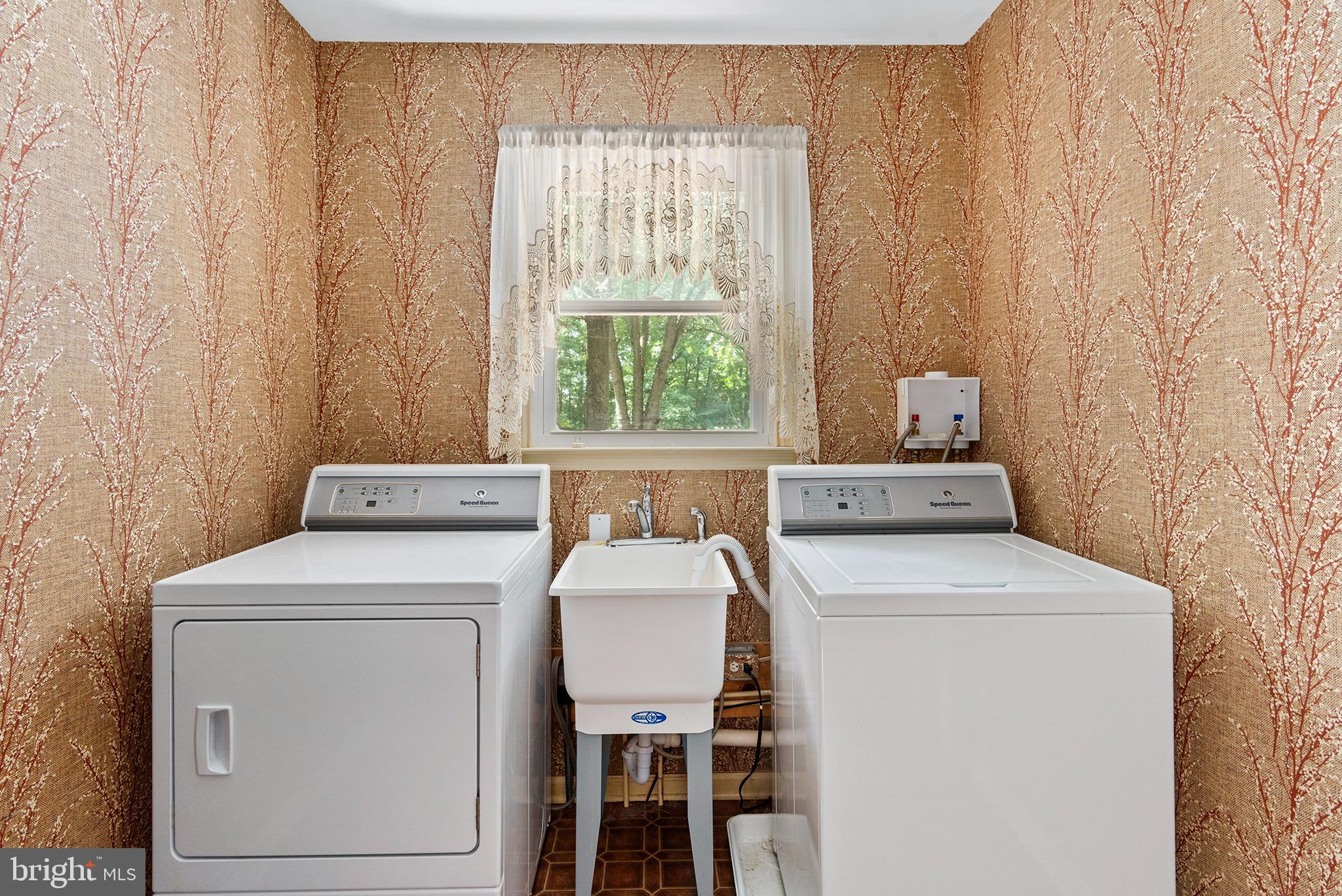 316 Caravel Drive Bear, DE 19701 - Photo 15 of 47 a utility room with dryer and washer