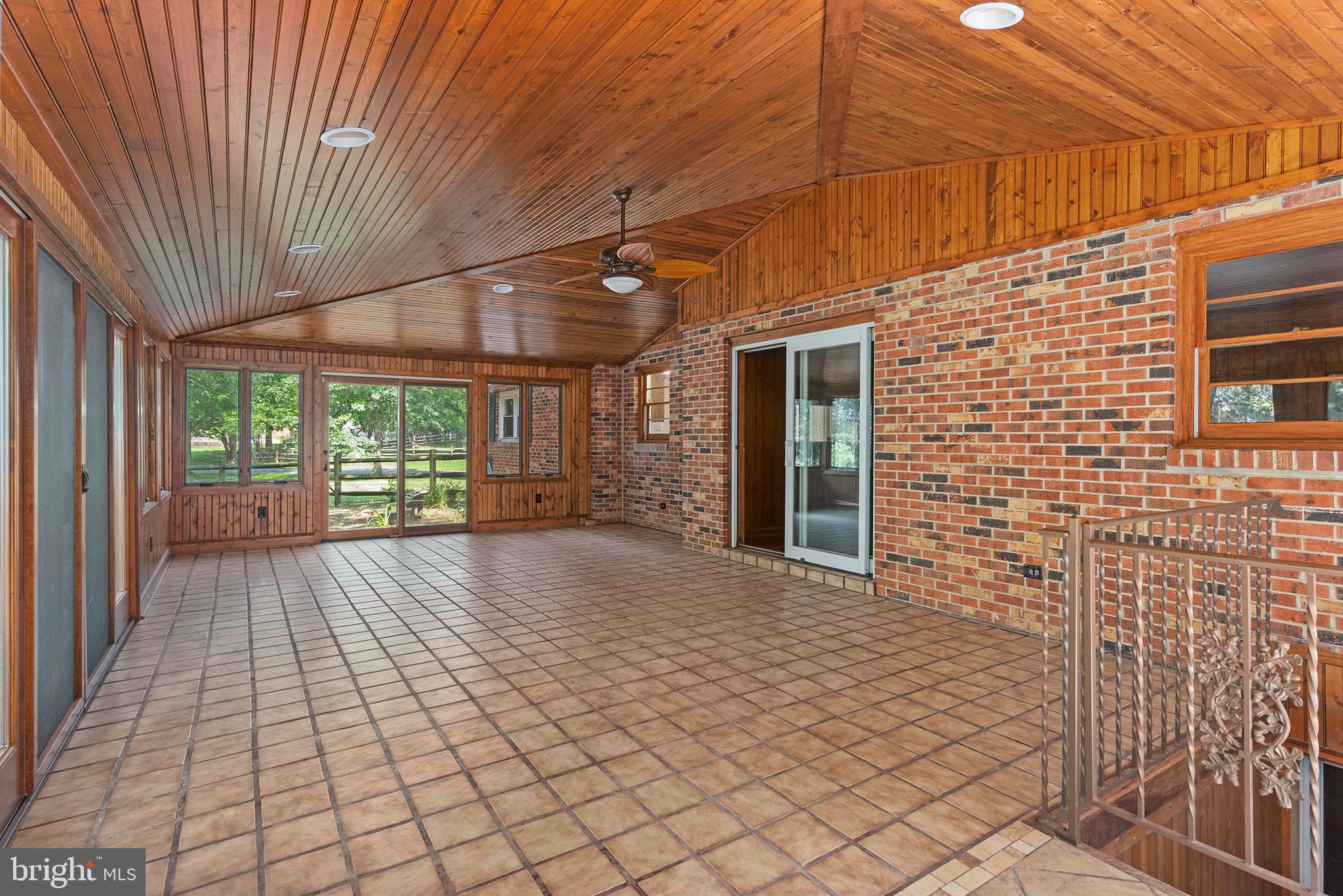 316 Caravel Drive Bear, DE 19701 - Photo 18 of 47 a view of a porch with wooden floor