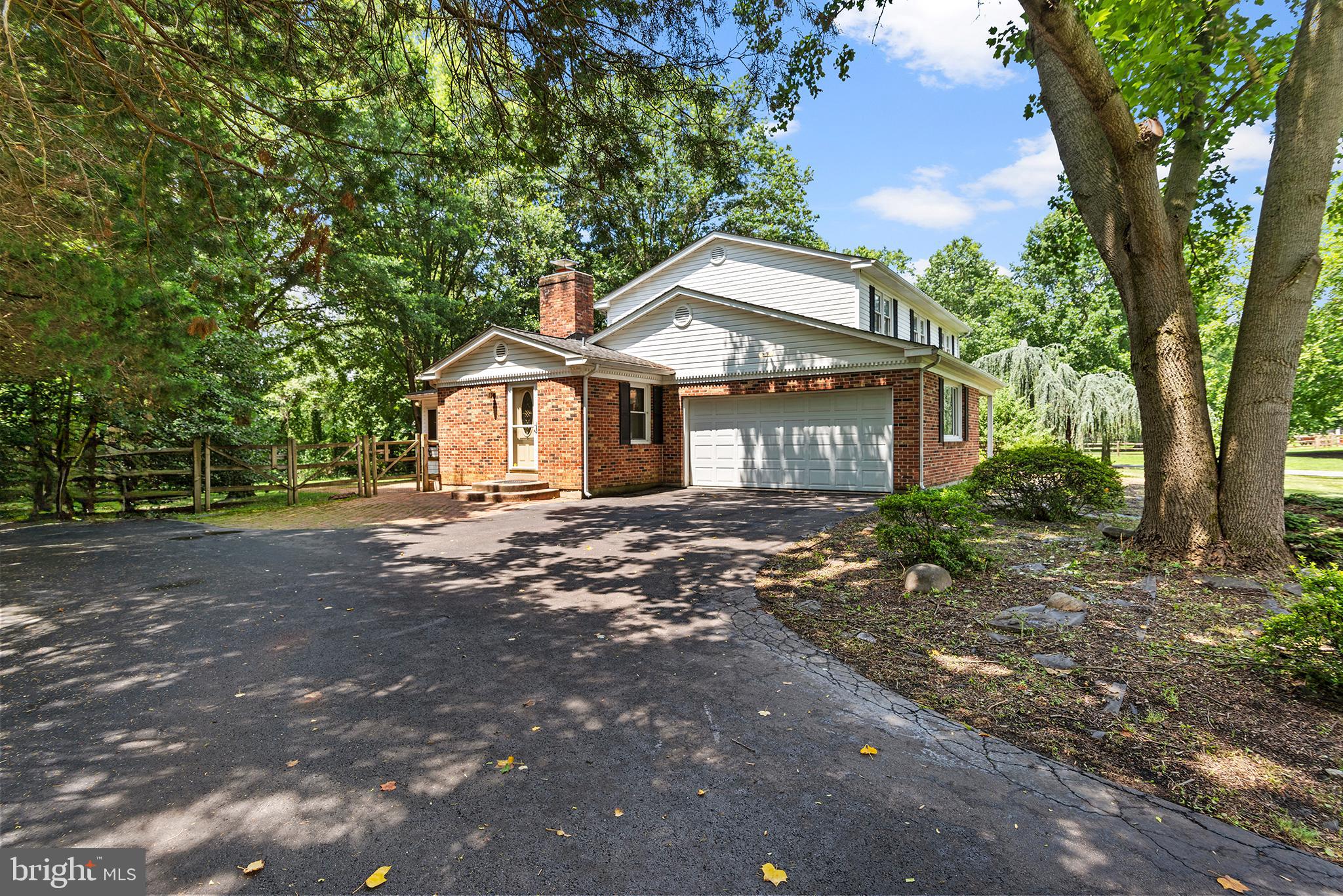 316 Caravel Drive Bear, DE 19701 - Photo 2 of 47 a front view of a house with a garden