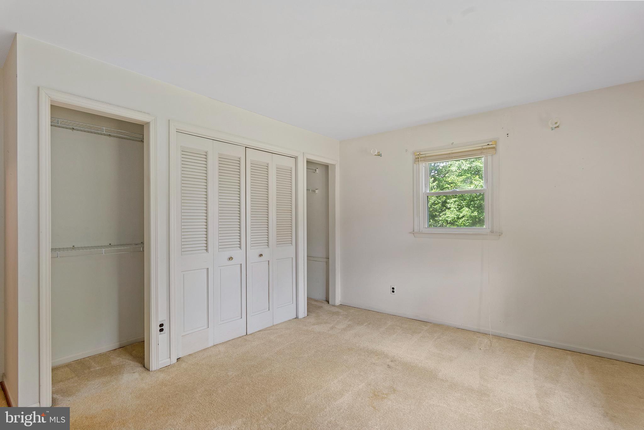 316 Caravel Drive Bear, DE 19701 - Photo 28 of 47 an empty room with windows and closet