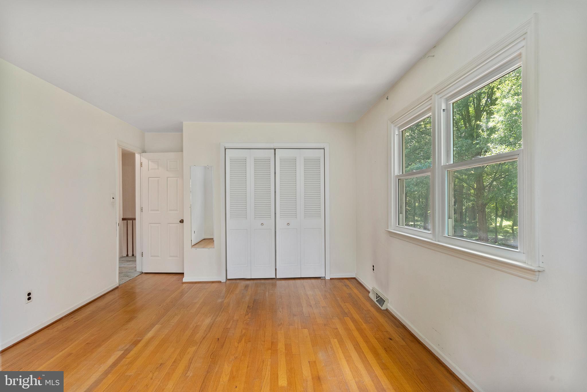 316 Caravel Drive Bear, DE 19701 - Photo 31 of 47 a view of a room with wooden floor and windows