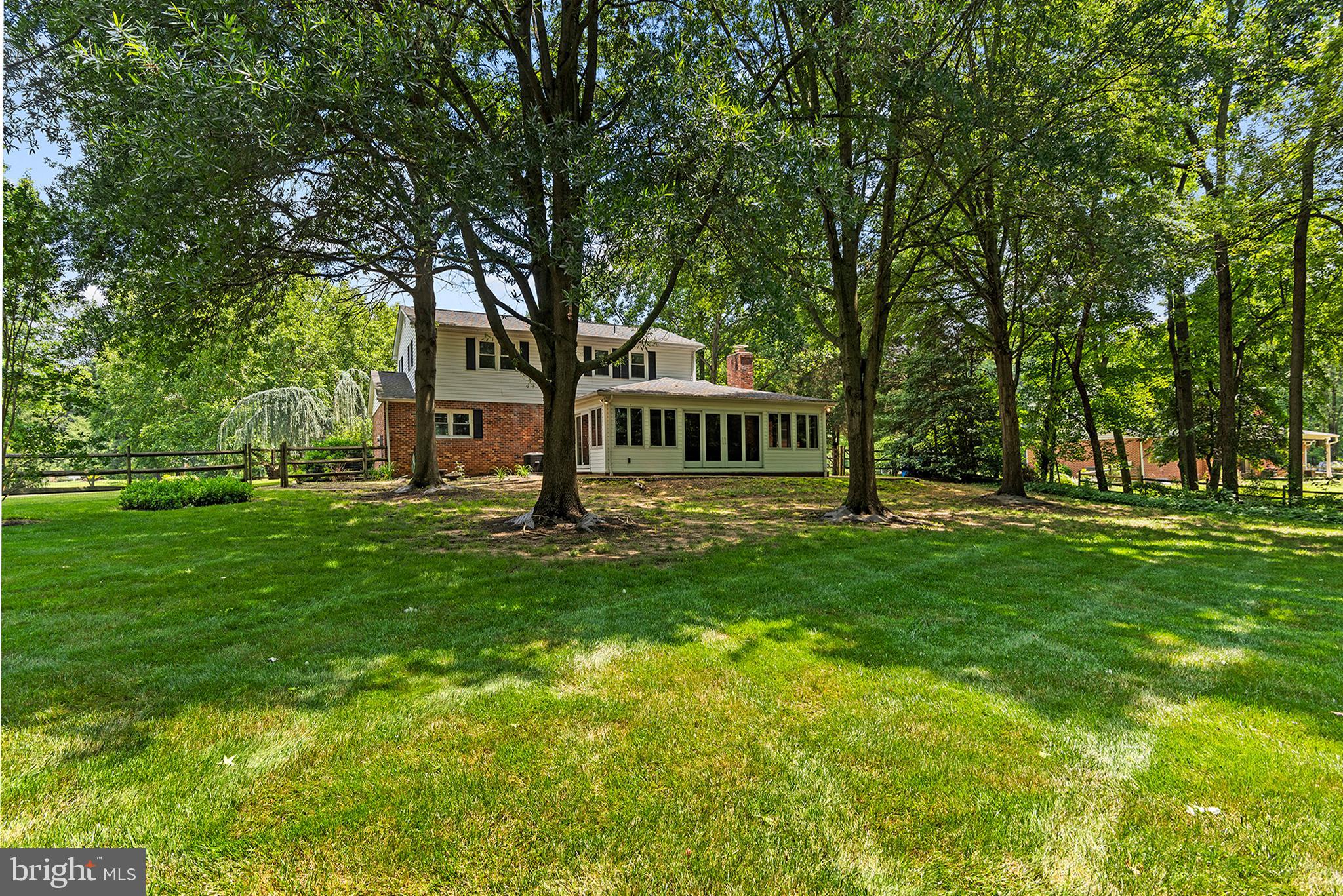 316 Caravel Drive Bear, DE 19701 - Photo 35 of 47 a view of a house with a big yard and large trees
