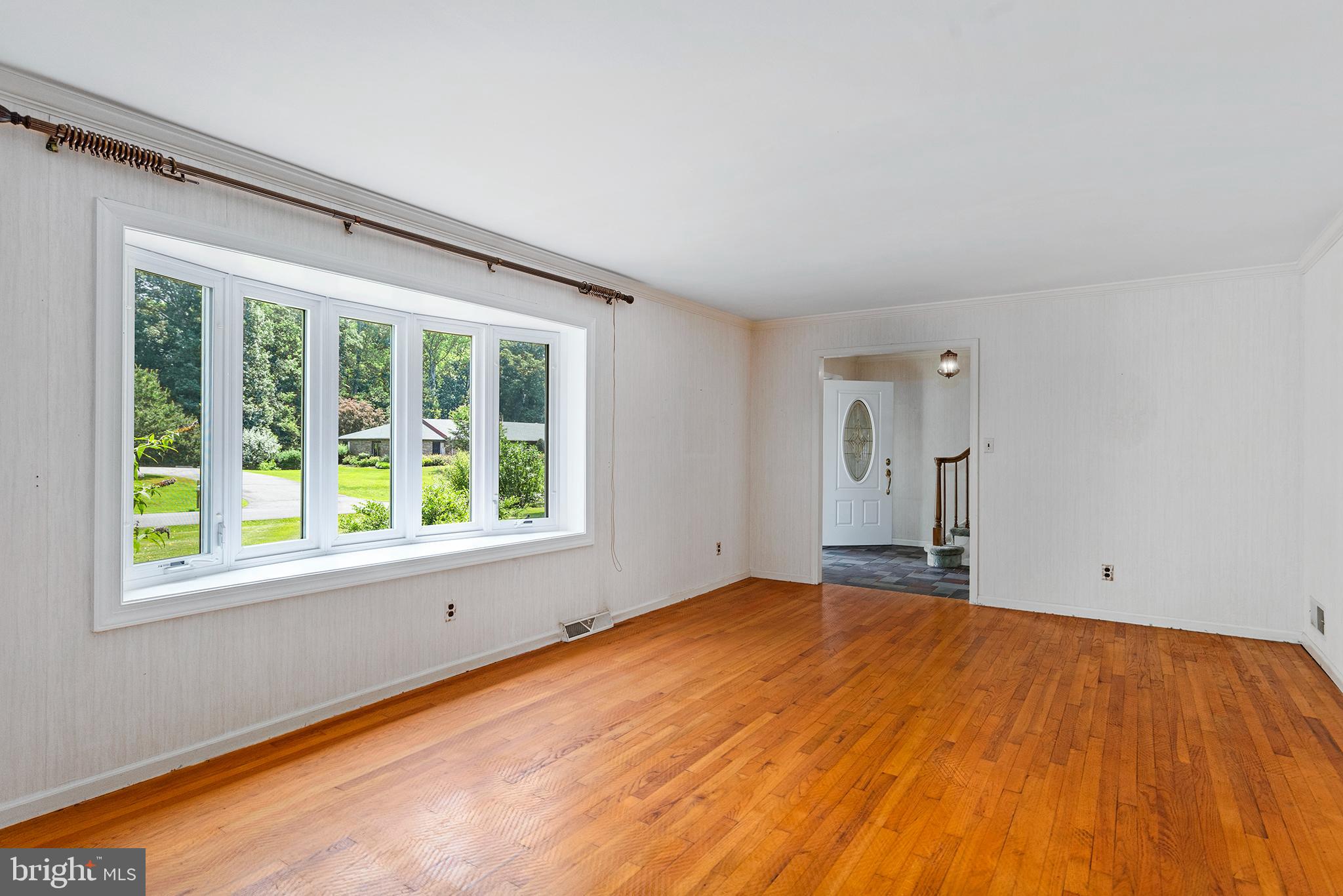 316 Caravel Drive Bear, DE 19701 - Photo 4 of 47 a view of an empty room with a window