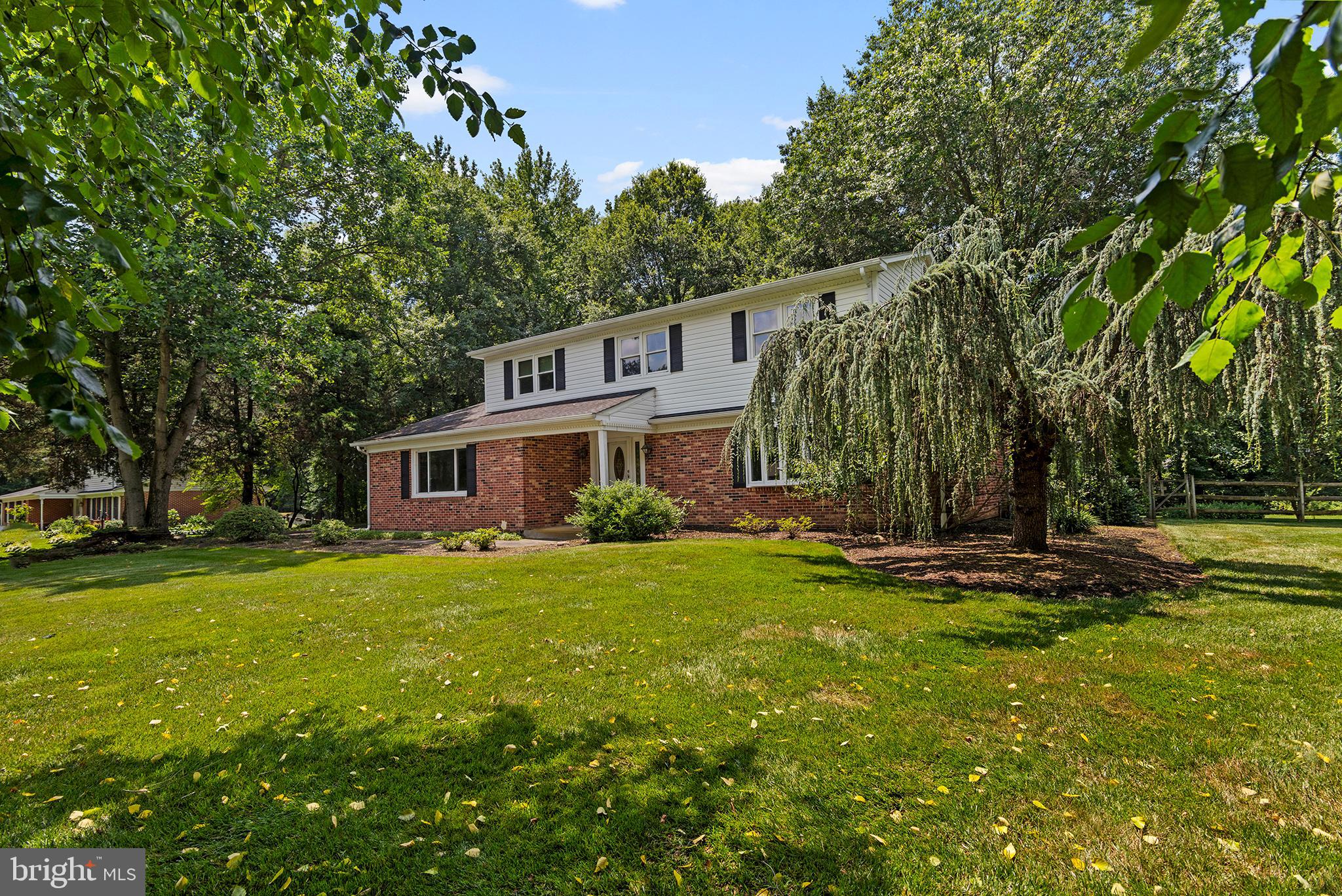316 Caravel Drive Bear, DE 19701 - Photo 42 of 47 a front view of a house with a garden