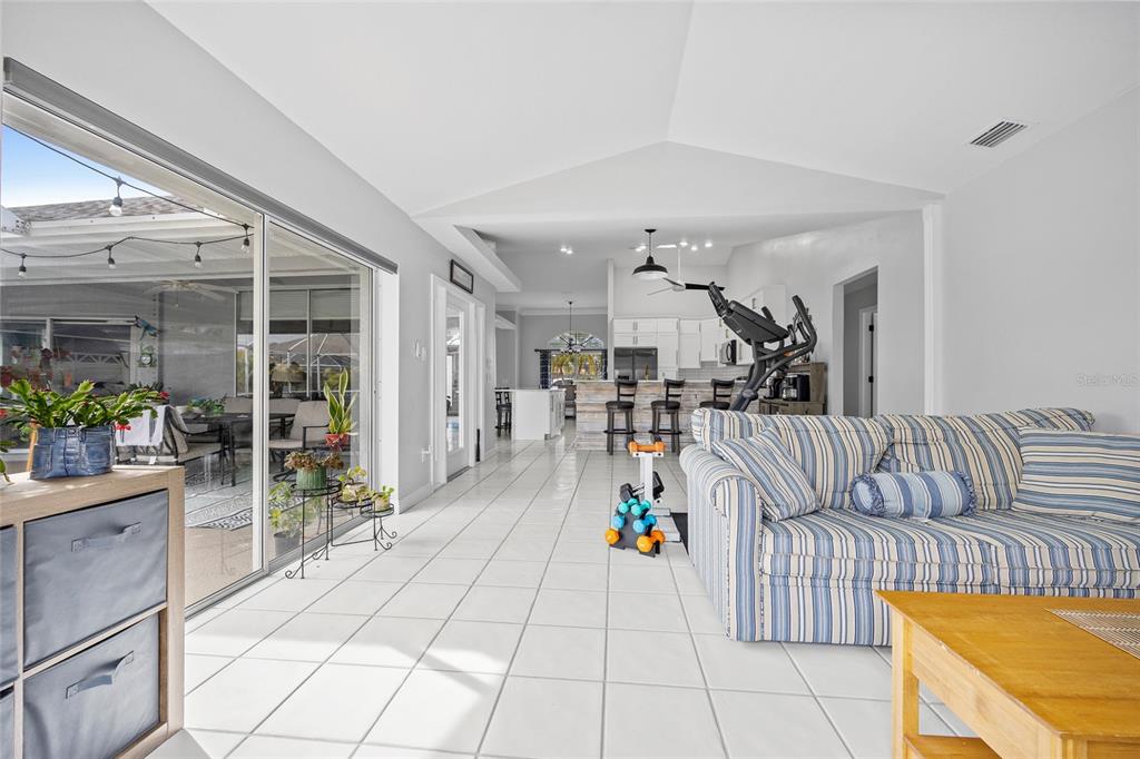 474 Orlando Boulevard Port Charlotte, FL 33954 - Photo 15 of 36 a living room with furniture and a table