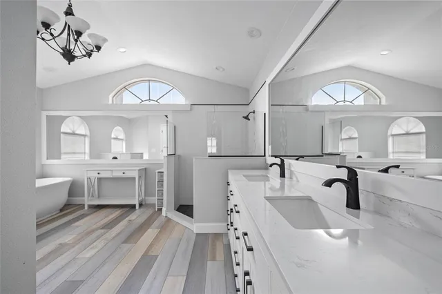 a living room with a baby crib and a window