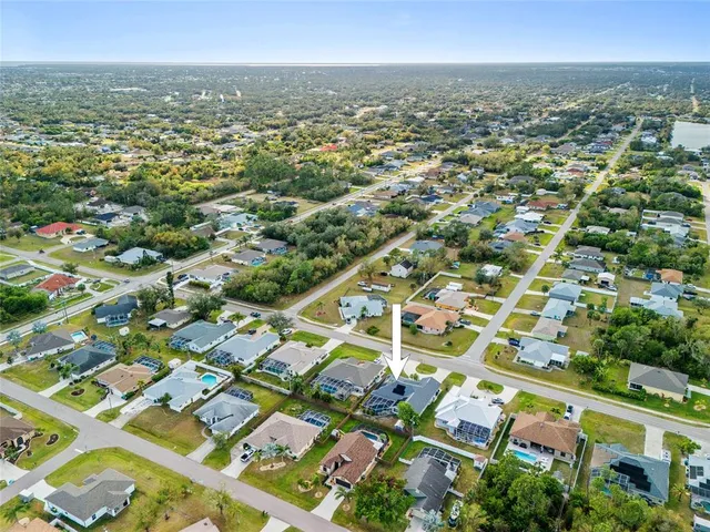 an aerial view of a city with lots of residential buildings