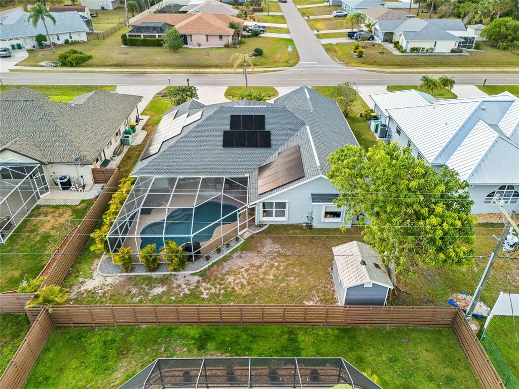 474 Orlando Boulevard Port Charlotte, FL 33954 - Photo 33 of 36 an aerial view of a house with a swimming pool