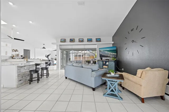 a living room with furniture and a table