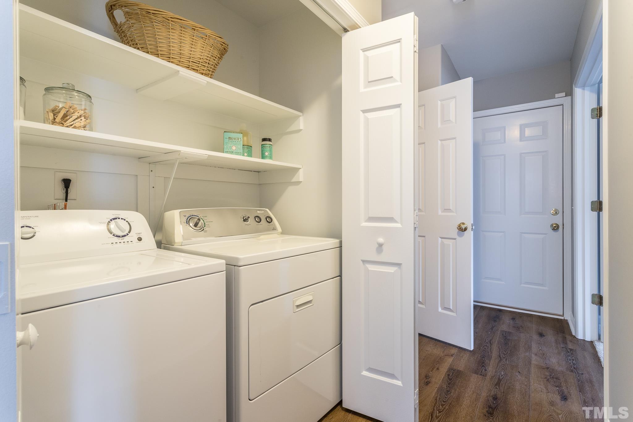 1307 Mallory Lane Durham, NC 27713 - Photo 24 of 29 a view of washer and dryer with wooden floor