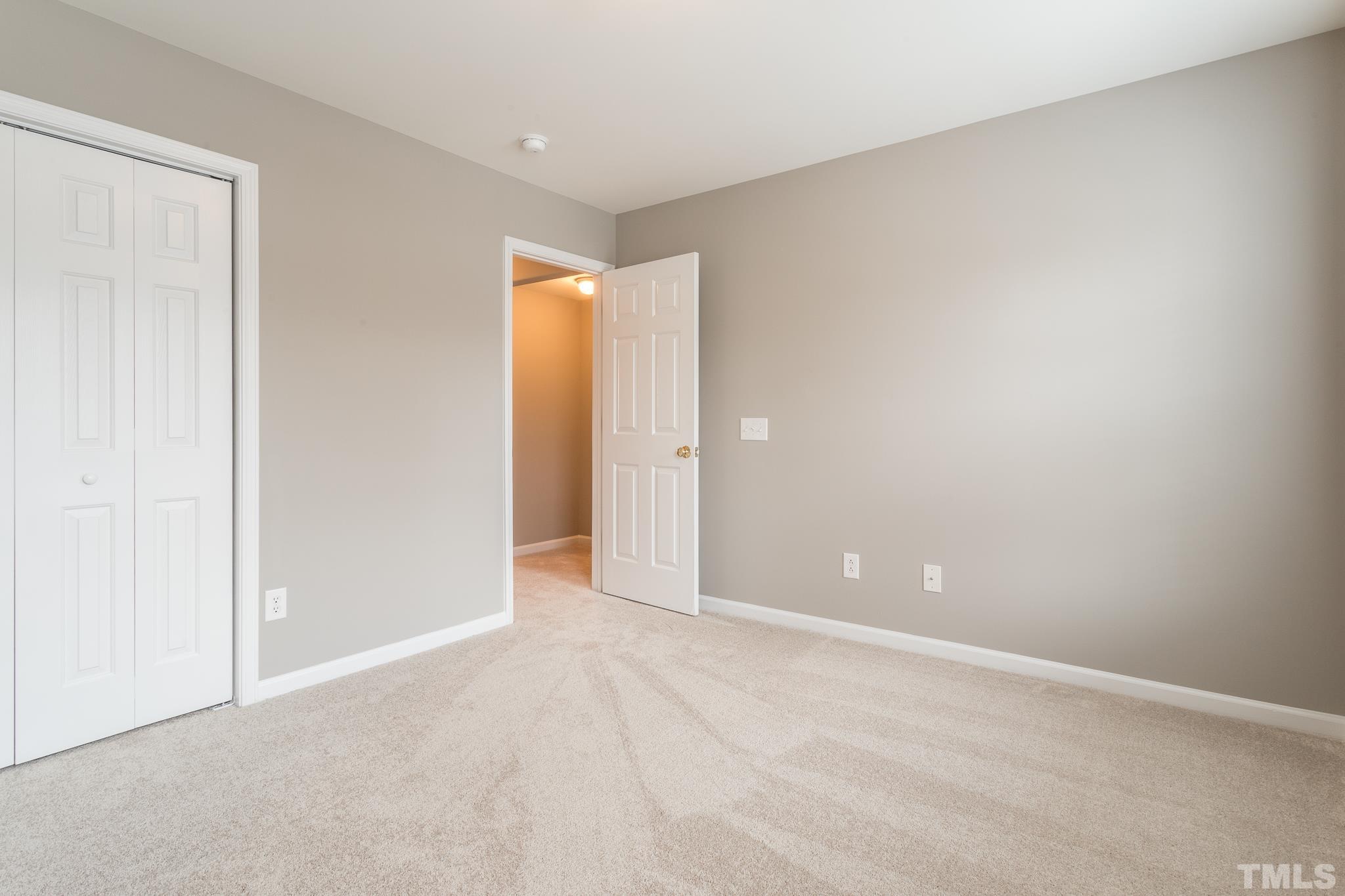 1307 Mallory Lane Durham, NC 27713 - Photo 29 of 29 an empty room with an entryway