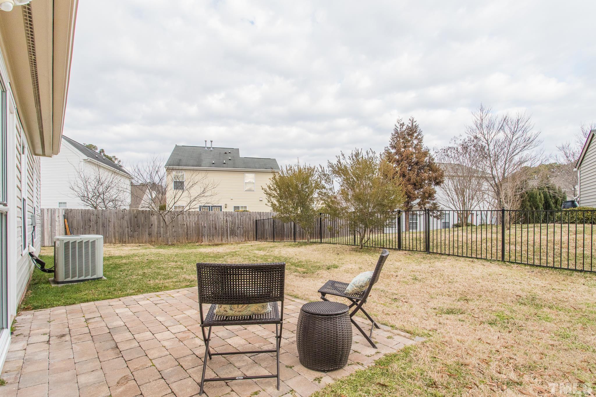 1307 Mallory Lane Durham, NC 27713 - Photo 8 of 29 a view of a backyard with sitting area