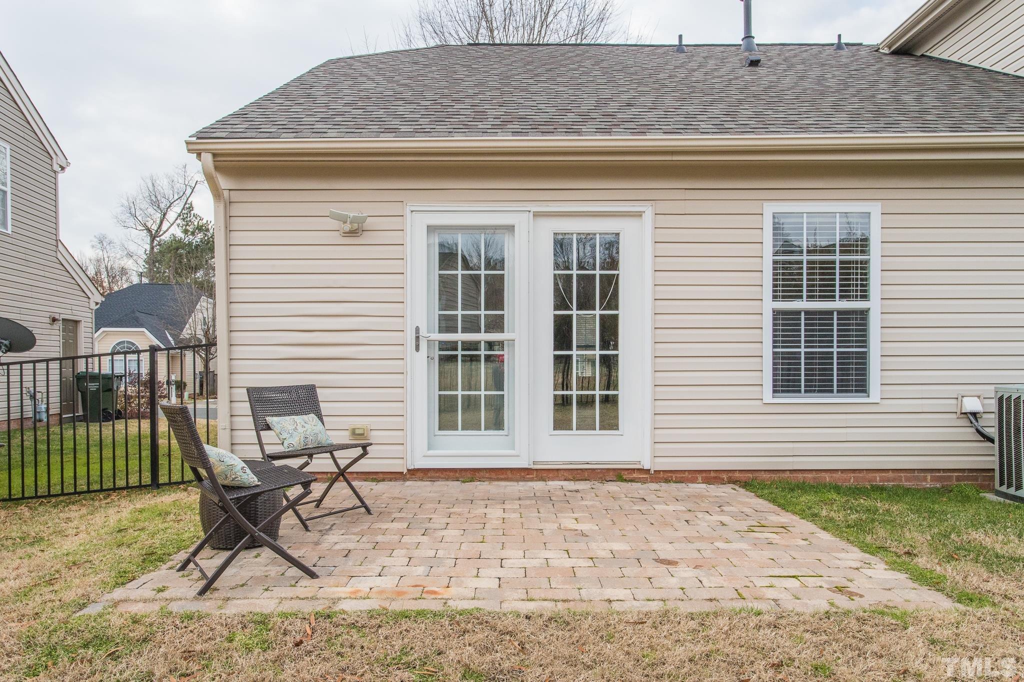 1307 Mallory Lane Durham, NC 27713 - Photo 9 of 29 a front view of a house with a yard and sitting area
