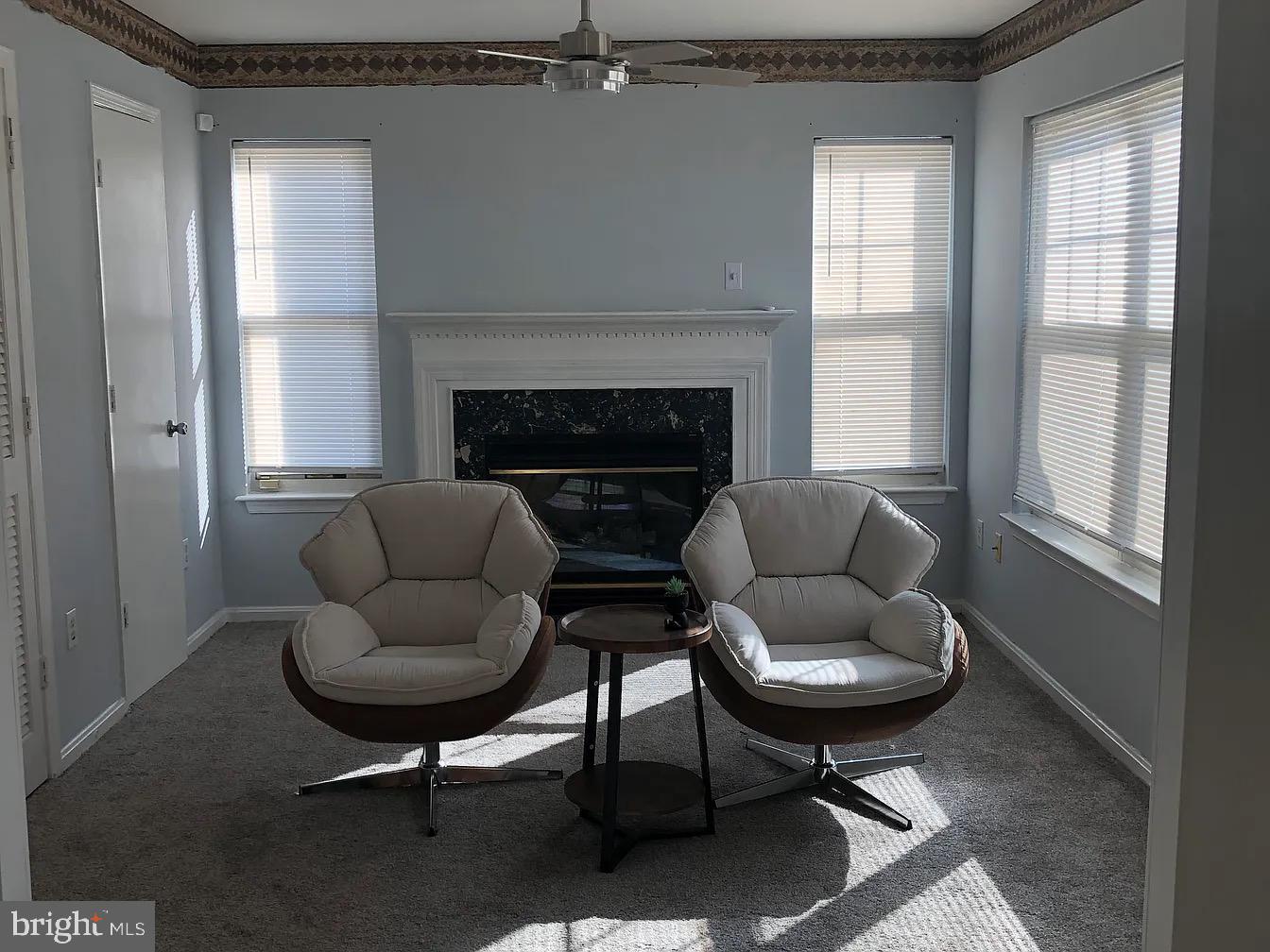 2 Catalpa Court Baltimore, MD 21209 - Photo 1 of 20 a living room with furniture and a fireplace