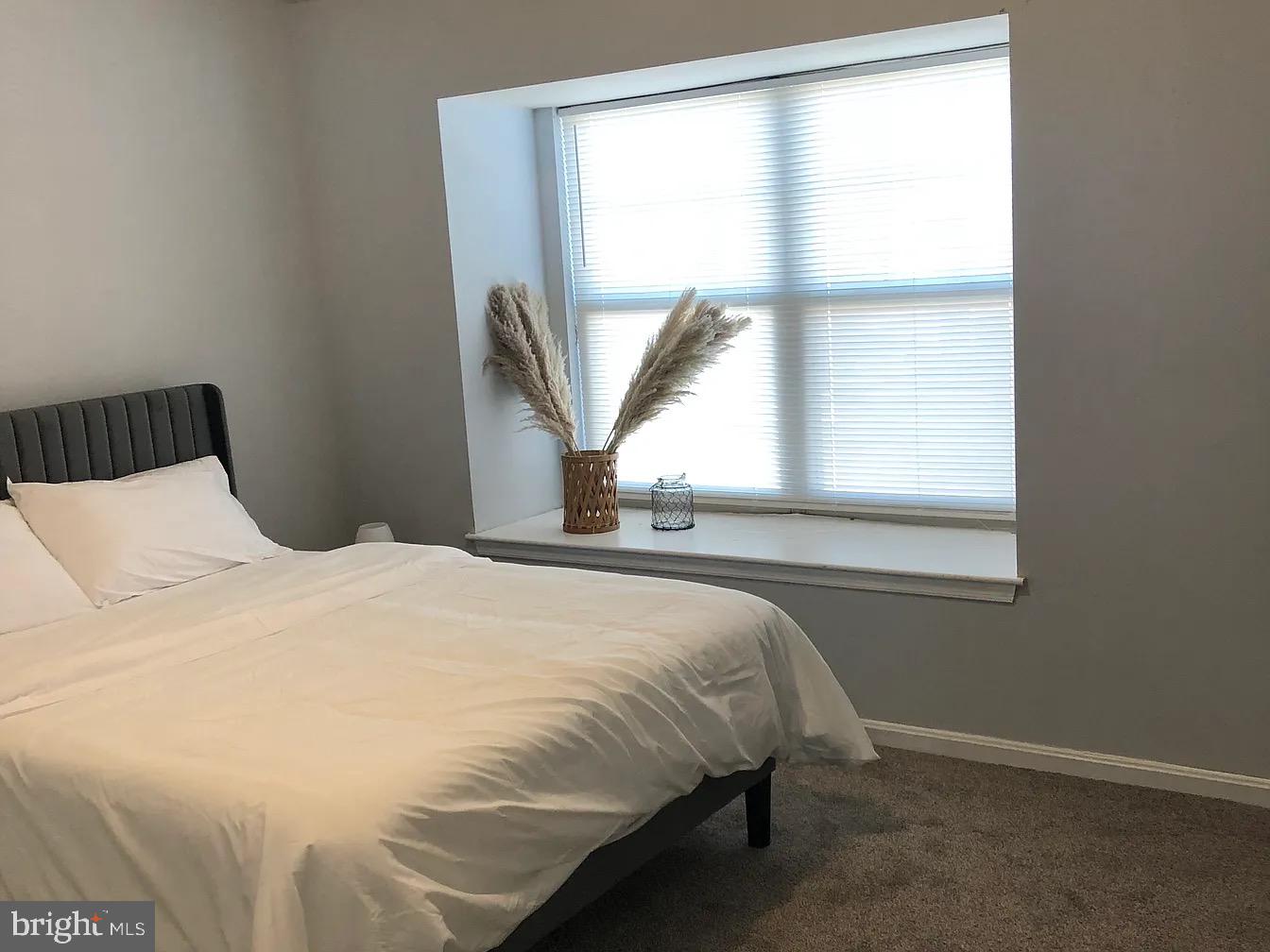 2 Catalpa Court Baltimore, MD 21209 - Photo 13 of 20 a bedroom with a bed and a window