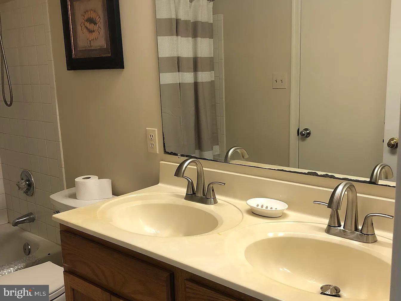 2 Catalpa Court Baltimore, MD 21209 - Photo 15 of 20 a bathroom with a sink and a mirror