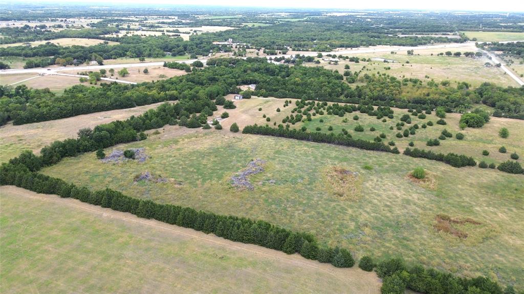0 County Road 635 Blue Ridge, TX 75424 - Photo 5 of 8 Expansive undeveloped land featuring a combination of open fields and varied tree coverage