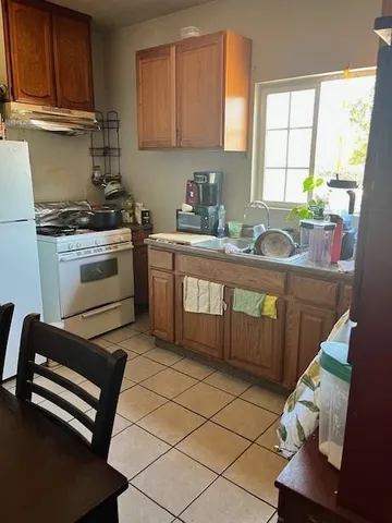 a bed room with a bed and a couch