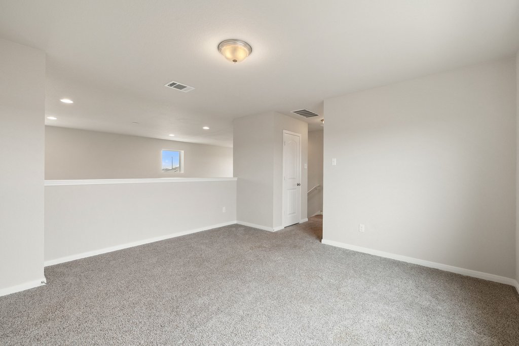 102 Ashford Way Georgetown, TX 78626 - Photo 18 of 28 Discover versatile living space, perfect for creating a cozy reading nook or home office.