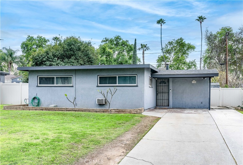 3150 Priscilla Street Riverside, CA 92506 - Photo 1 of 1 a front view of house with yard and outdoor seating