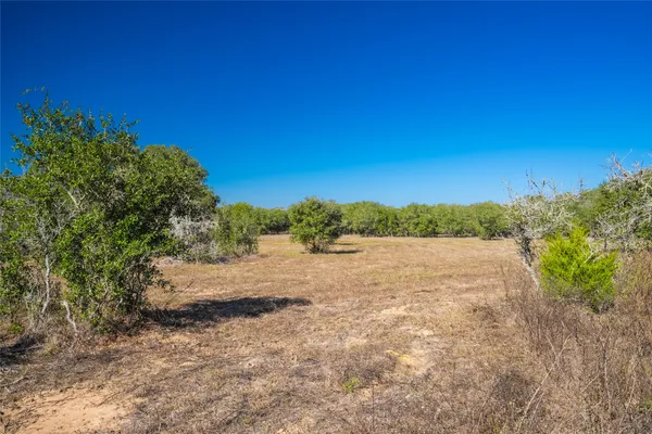 a view of an outdoor space with a lake view