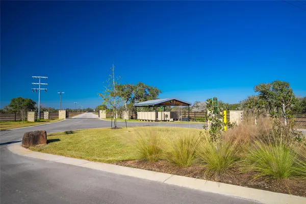 a view of a swimming pool with an outdoor space and seating area