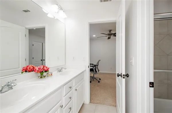 a bathroom with a sink a toilet and a bathtub