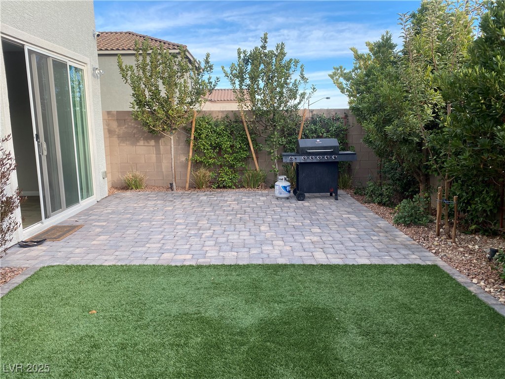 9343 Sully Avenue Las Vegas, NV 89149 - Photo 26 of 27 View of patio featuring a fenced backyard and area